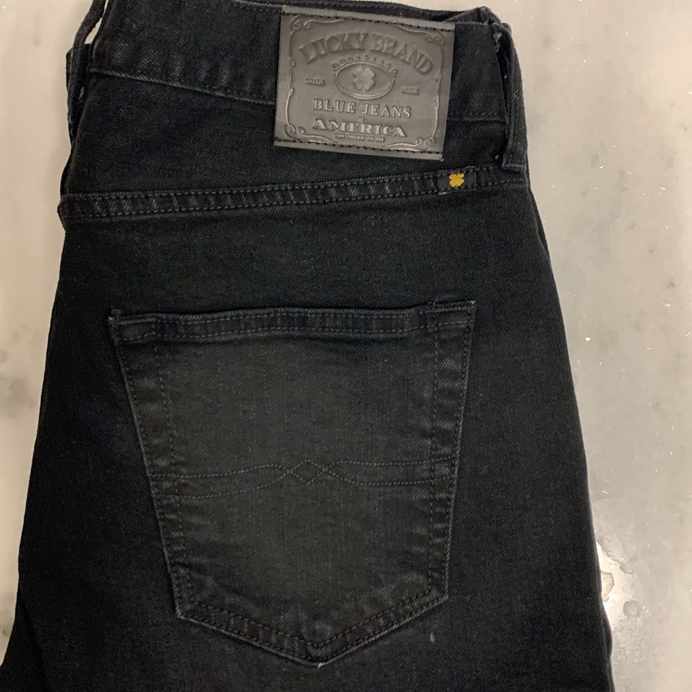 Black Lucky Brand 410 athletic fit straight leg jean.